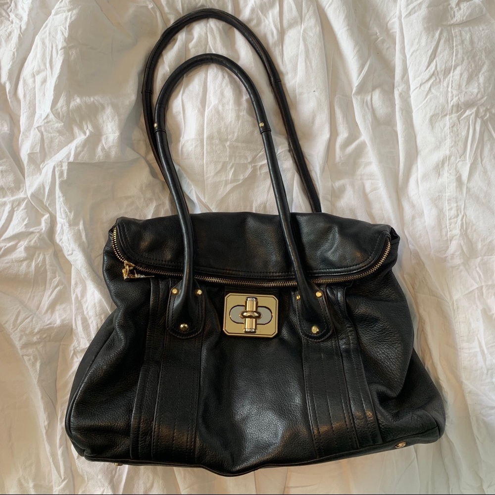 Black leather purse with gold details
